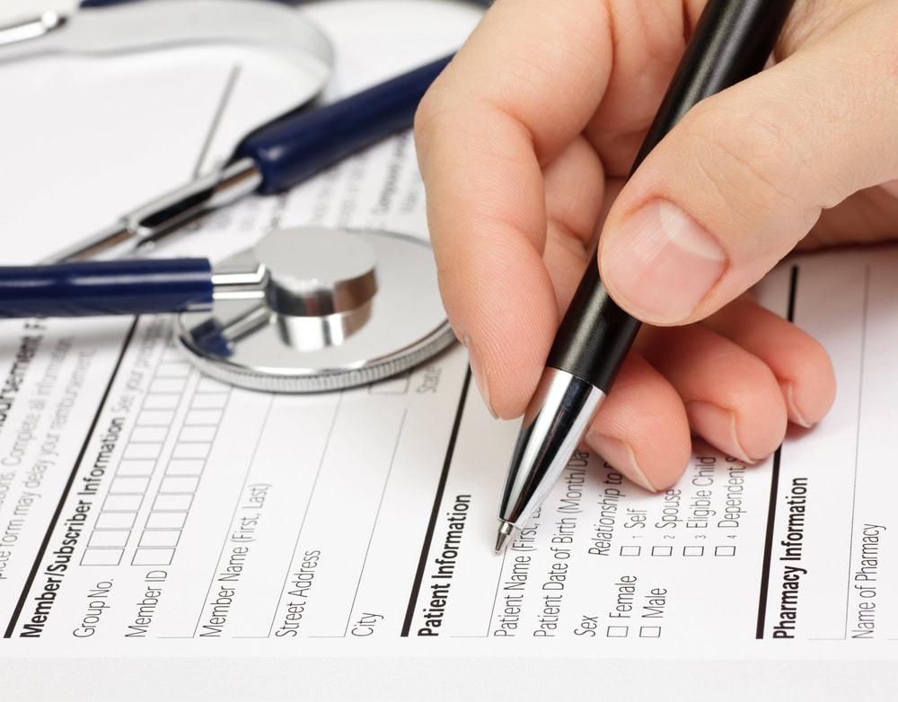 Chicago fall injury lawyer reviewing medical records for a claim