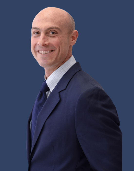 Jonathan Rosenfeld with a dark blue background